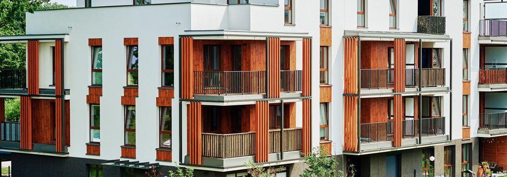 Modern residential complex. Facade of new house block in Europe. Complex of apartment residential buildings in Warsaw